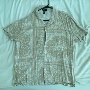 beige button up shirt